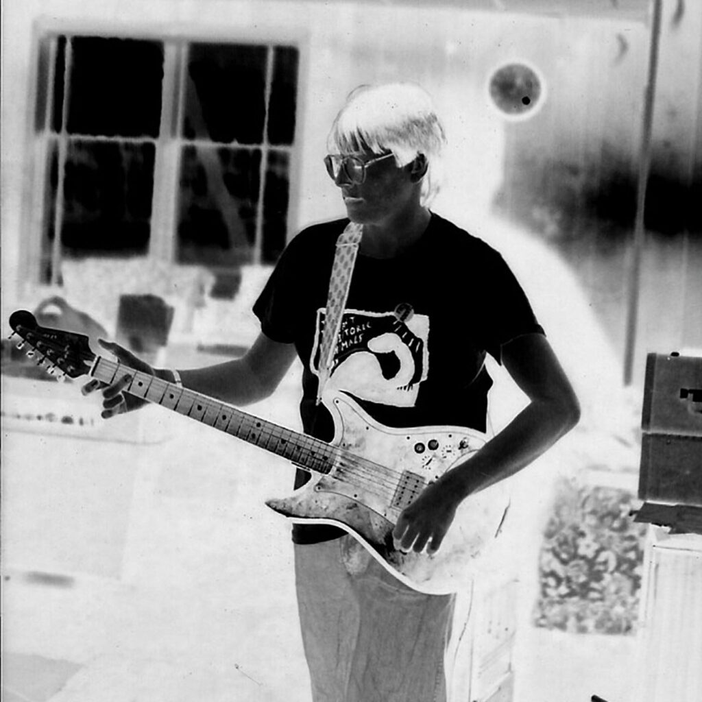 Chris playing guitar